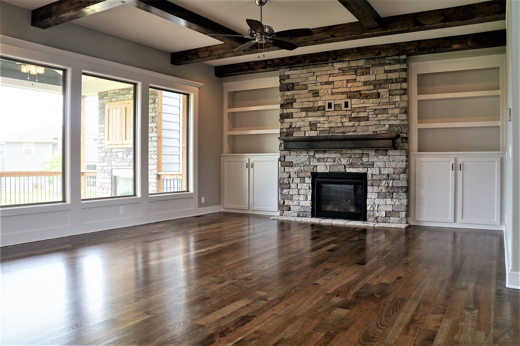 beautifully remodeled hearth in home with hardwood floors