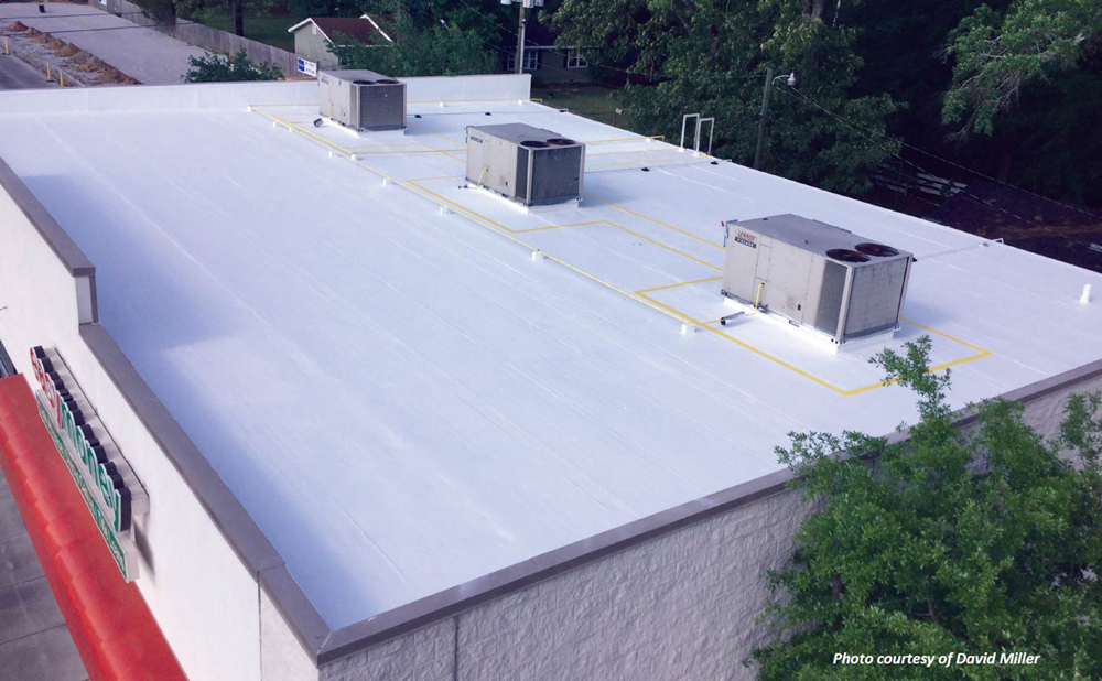 a white roof with a few air conditioners on it