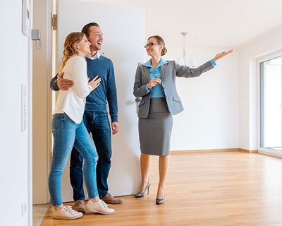 Realtor — Realtor Showing House to Couple in Jacksonville, FL