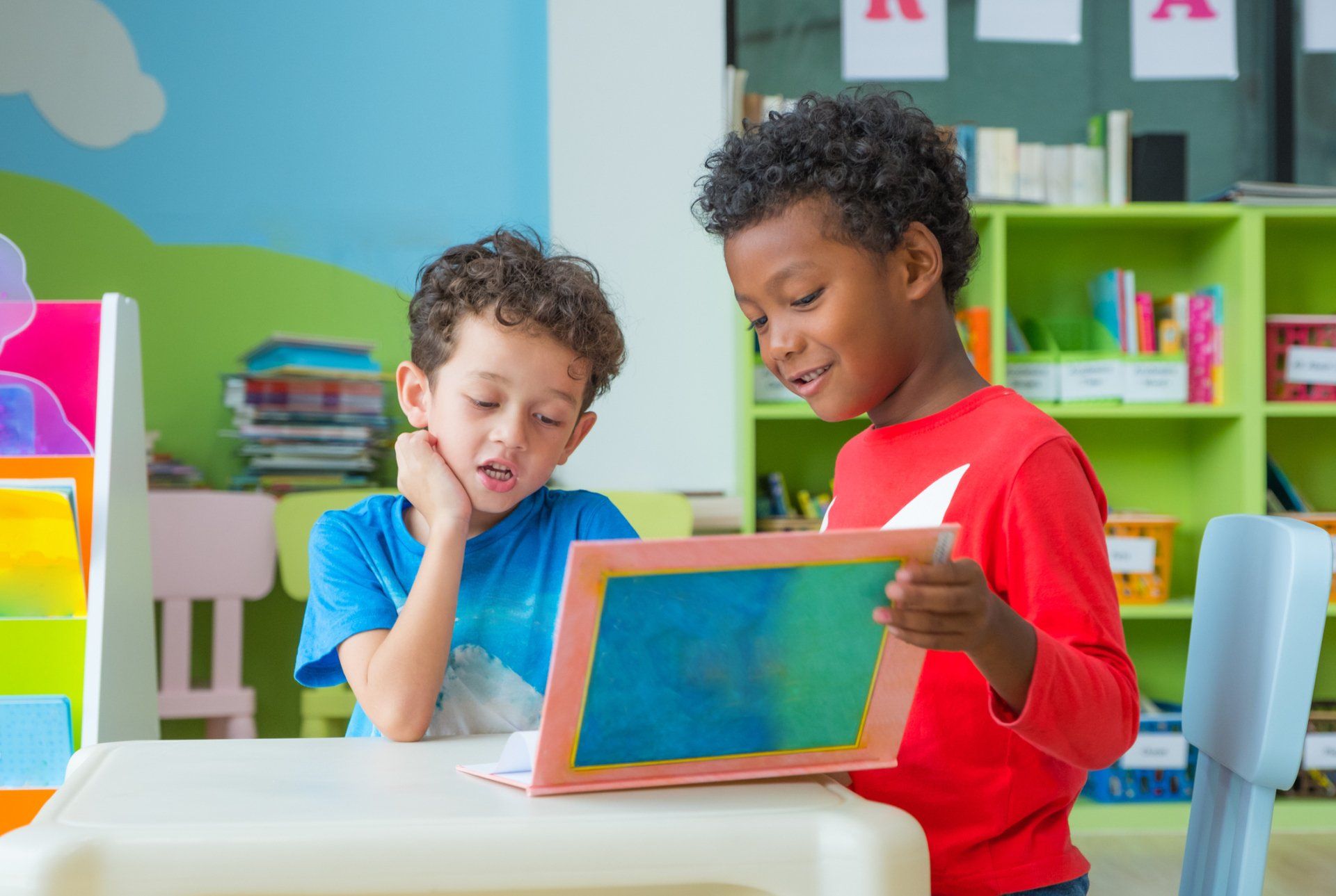 Boys Reading Book — Cheyenne, WY — The Backyard Child Care Center