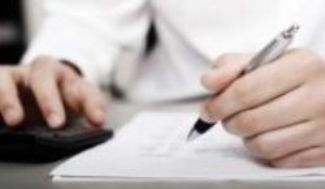 Papers being signed by a lawyer