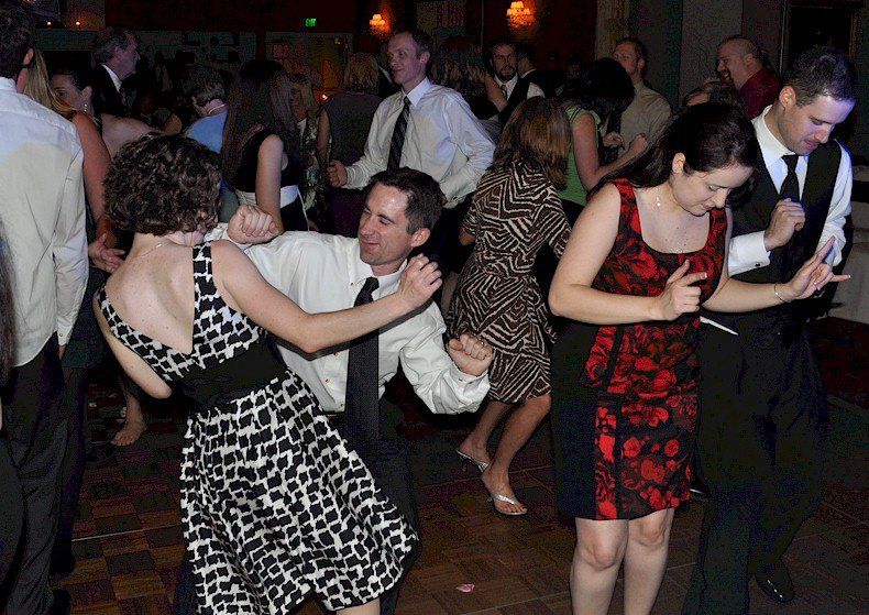 wedding guests dancing at church landing, meredith, New Hampshire