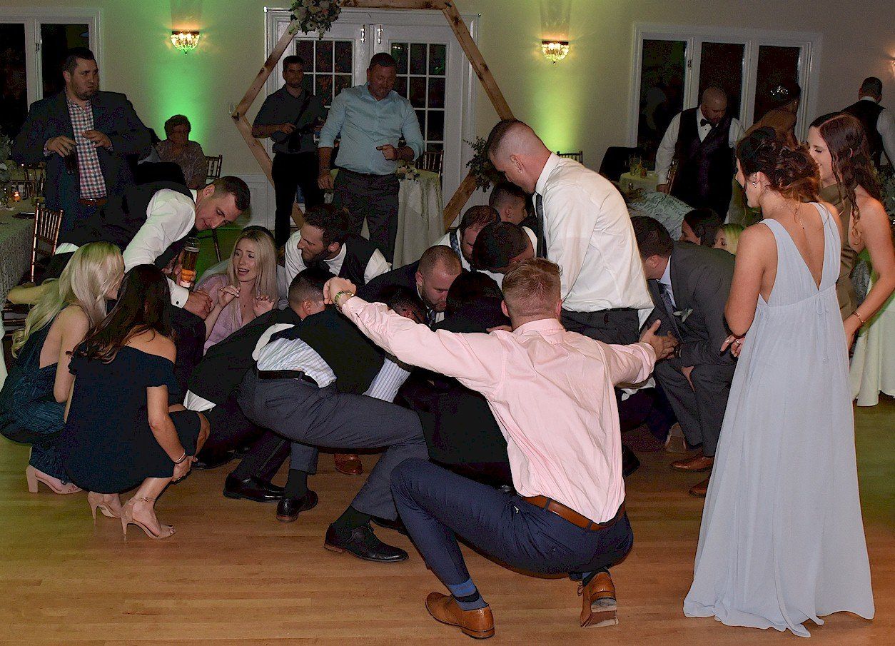 wedding guests Disc Jockey dancing at Floriana at the Hellenic Center Center Ipswich MA