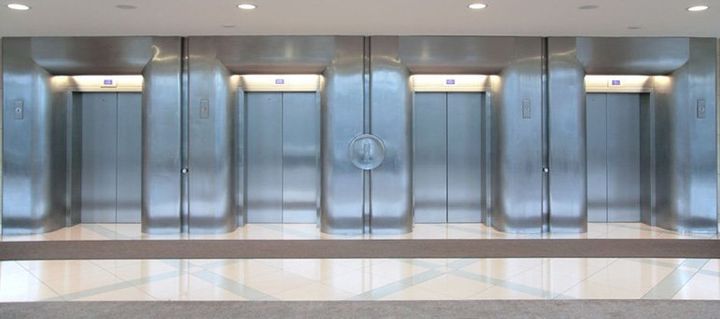 For professional lift design in Scotland, call Scotec Lifts Ltd on 0141 646 0900 Image of 4 commercial lifts in chrome finish
