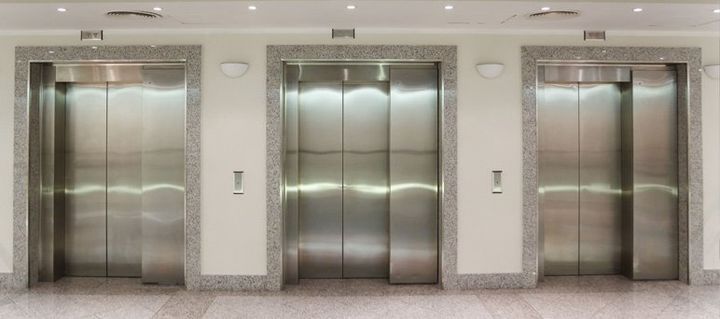 For lift installation & on going lift support, call Scotec Lifts Ltd on 0141 646 0900 Image of three lifts in commercial building