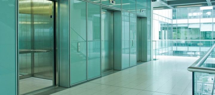 Image of 3 lifts in a commercial buildin on 1st floor Image of 3 lifts in a commercial buildin on 1st floor