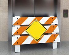 For lift repair throughout Scotland, call Scotec Lifts Ltd on 0141 646 0900 Image of no entry sign in front of broken lift
