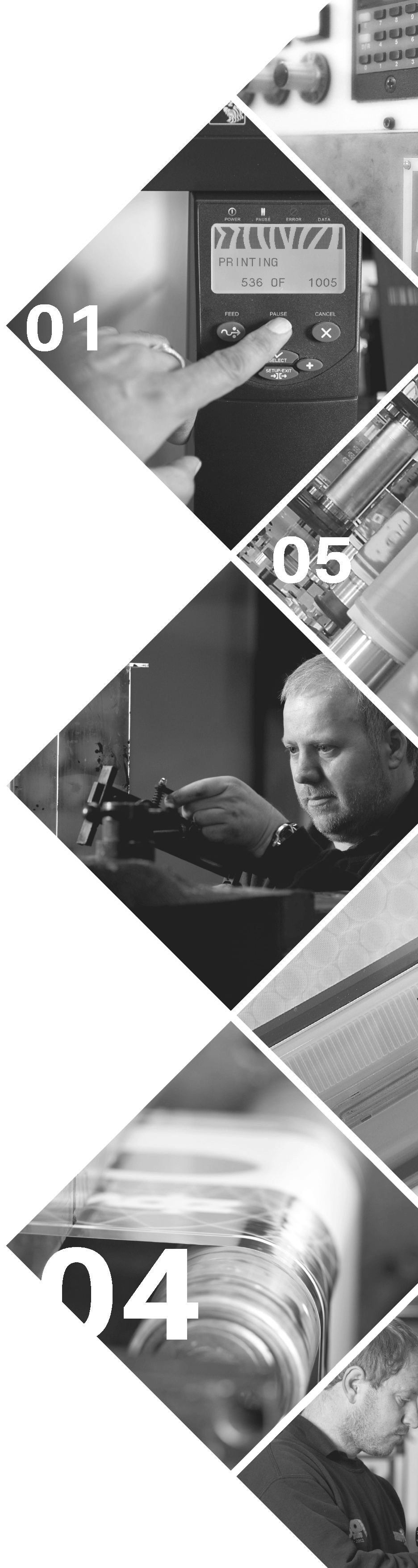 A black and white photo of a man working on a machine