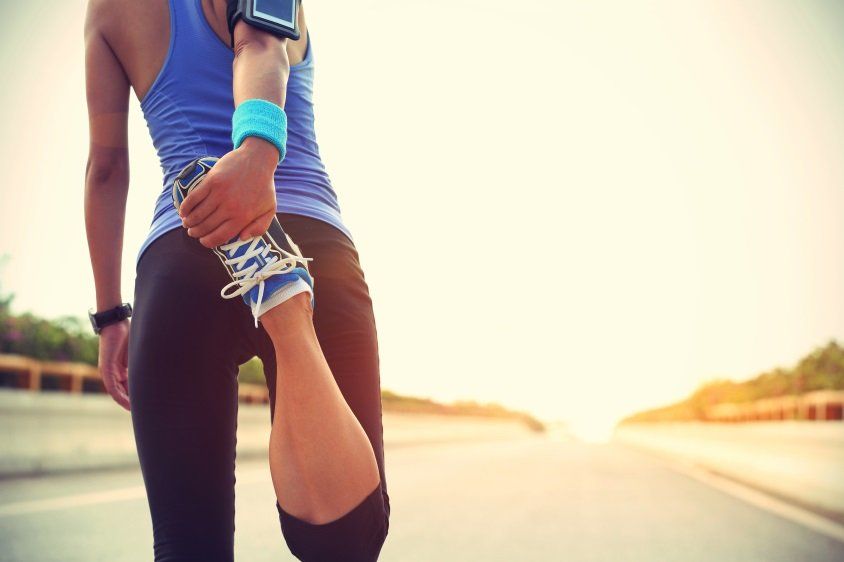Female athlete warming up