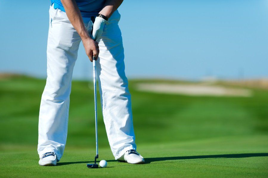 Man playing golf
