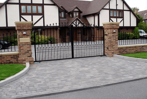 Driveway with large metal gates