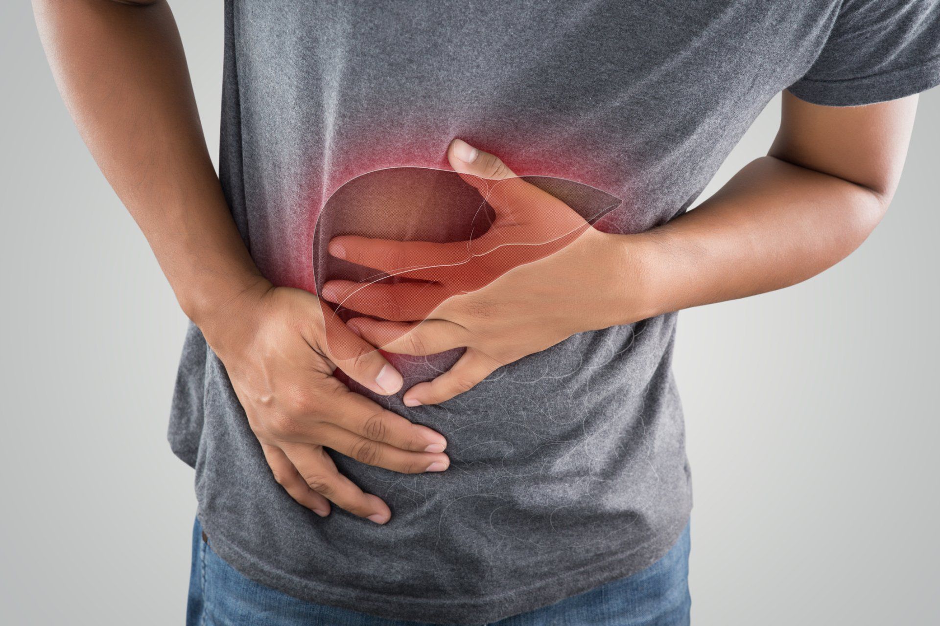 Man Holding His Stomach — Susanville, CA — Riley Law Offices Man Holding His Stomach — Susanville, CA — Riley Law Offices