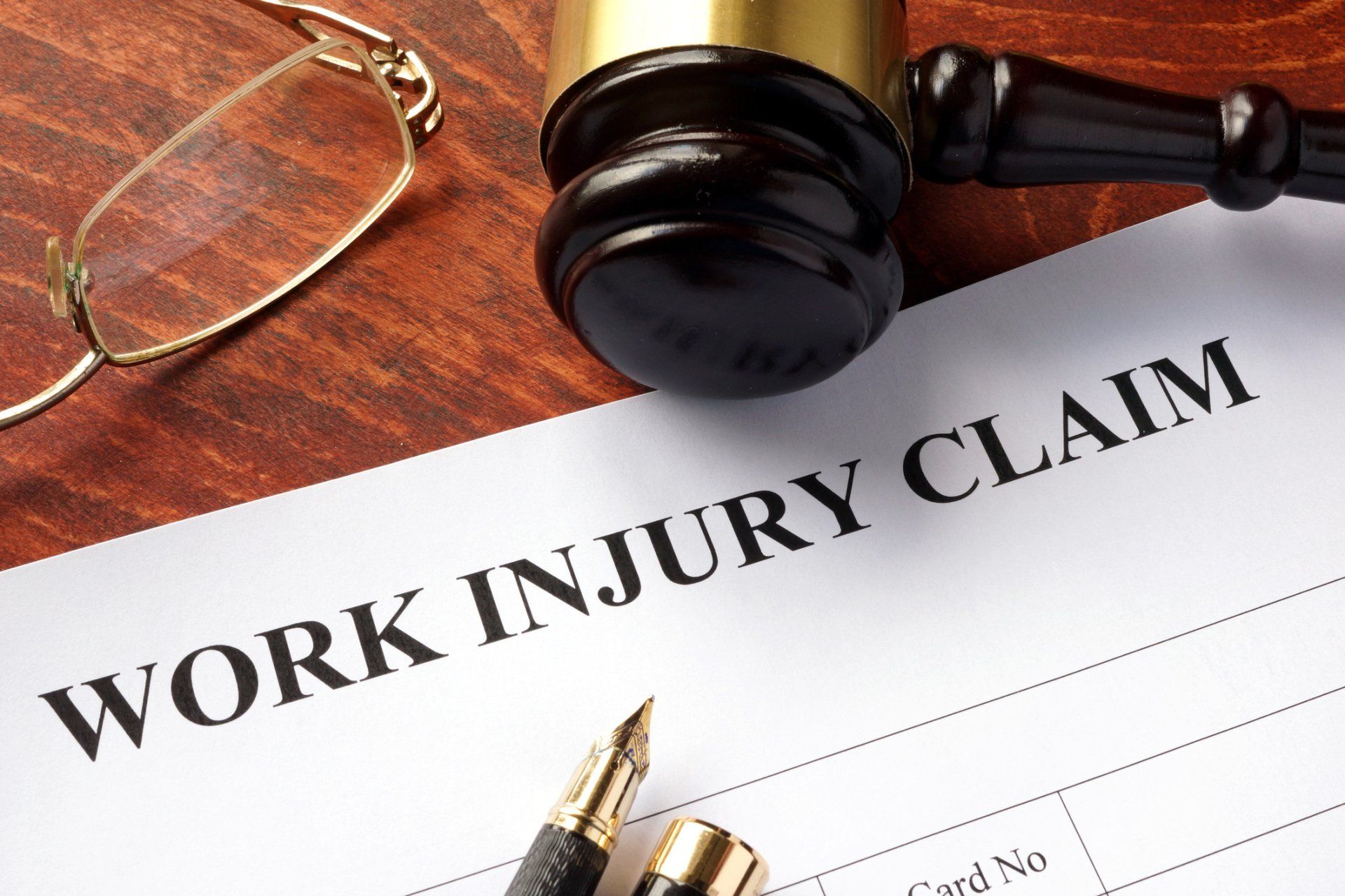 Work Injury Form with Gavel — Susanville, CA — Riley Law Offices Work Injury Form with Gavel — Susanville, CA — Riley Law Offices