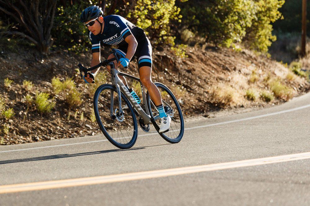 Man on a Gray Giant Road Bike