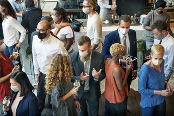 group of people in masks