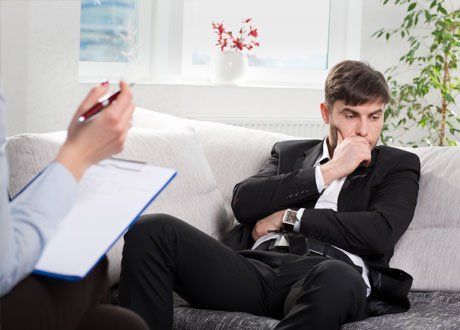 man listening to his lawyer