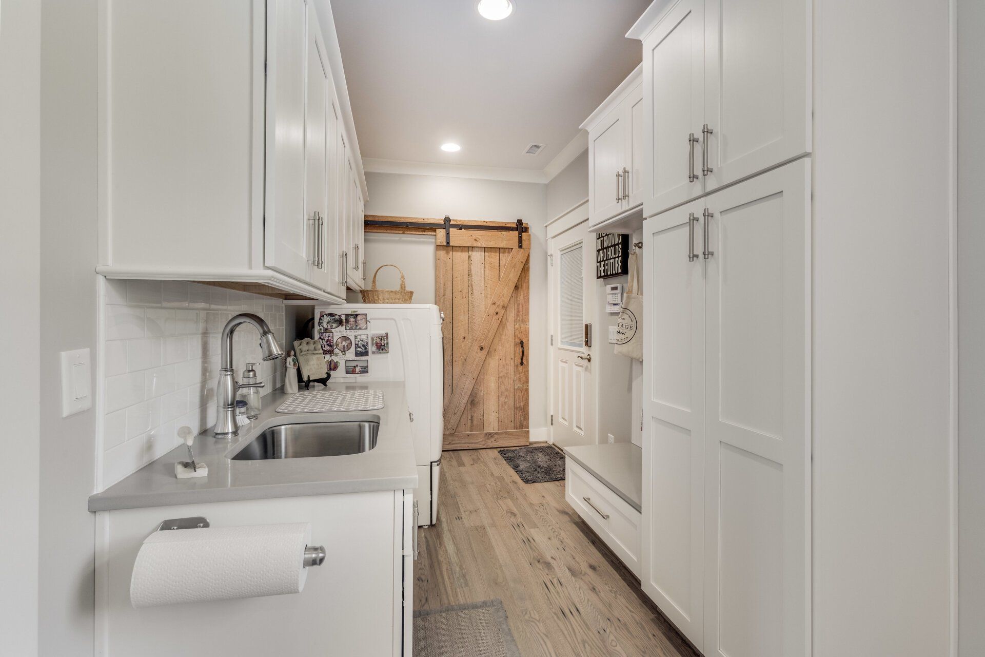 Custom White Laundry Room Cabinets With Sink