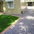gray concrete tile driveway