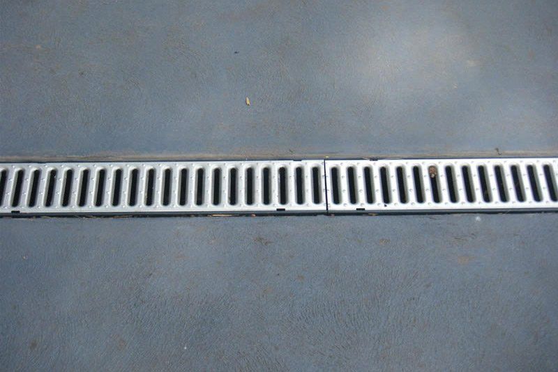 drain in concrete driveway