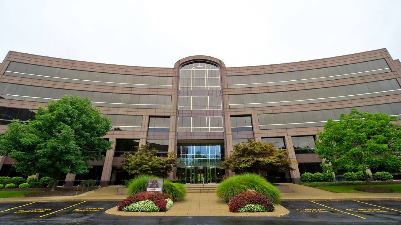A large brown office building