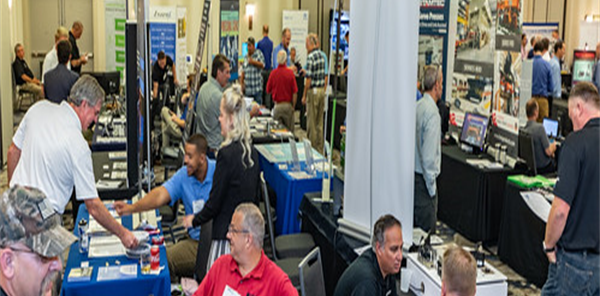 A convention, with many tables and info boards.