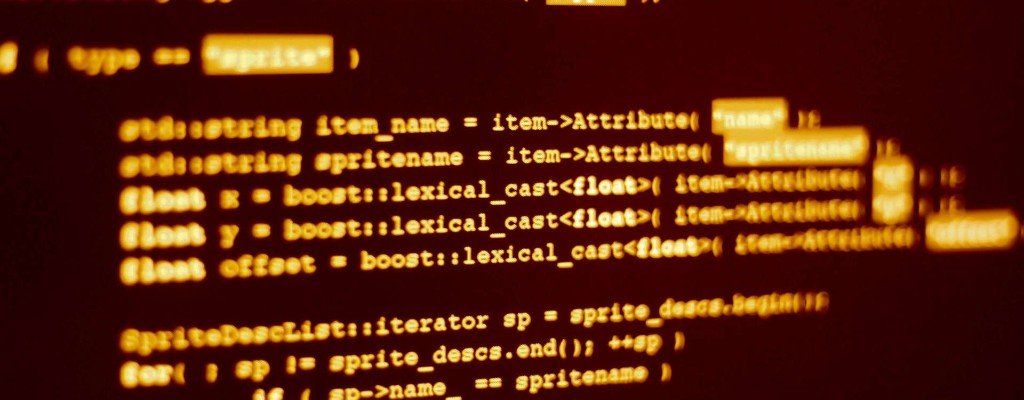 A closeup of C++ code illuminated in yellow. All occurrences of strings are highlighted.