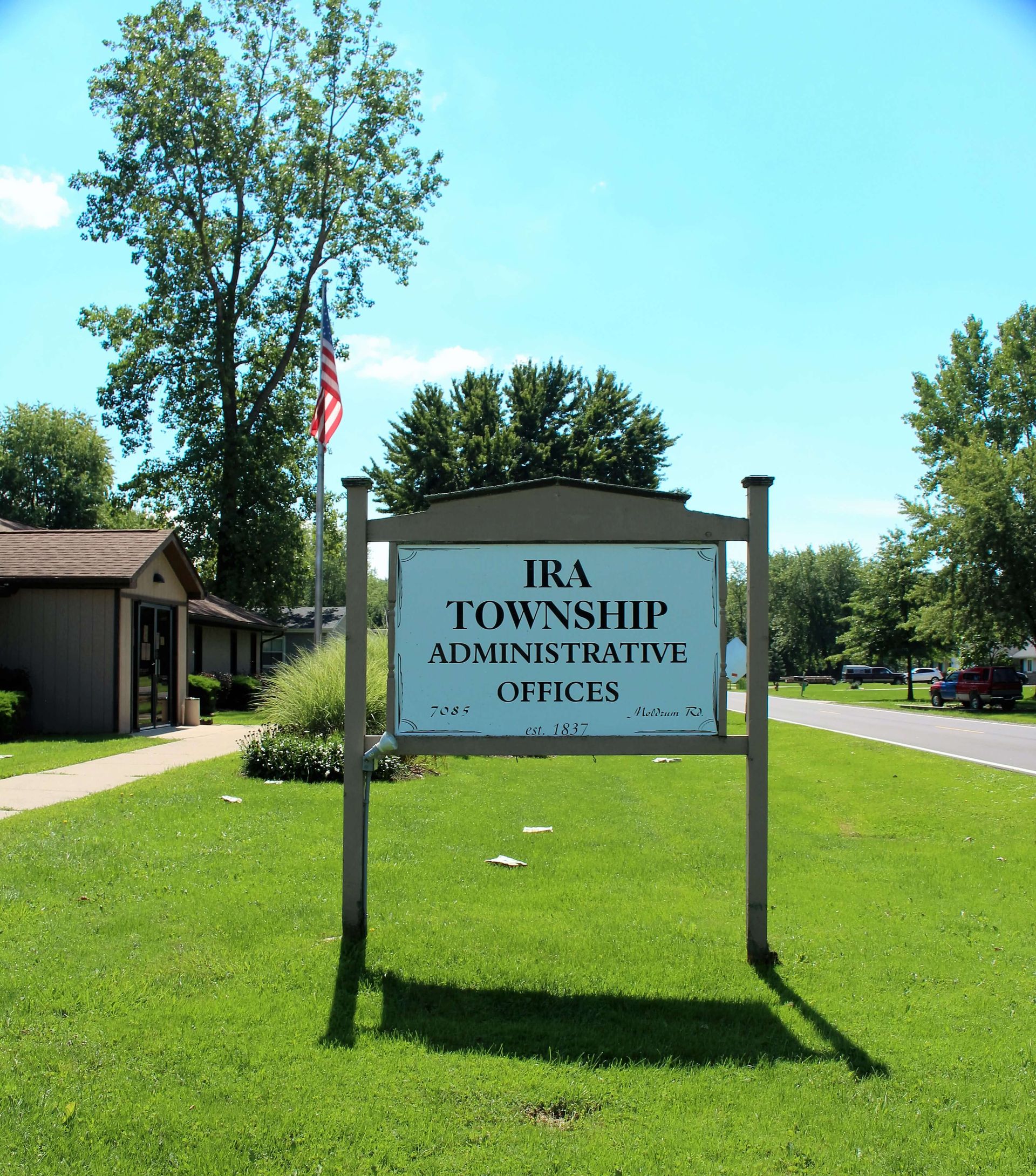 A sign for the Ira Township administration offices.