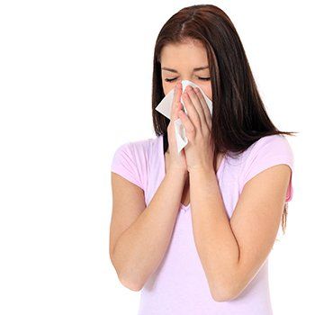 Girl Sneezing — DeSoto TX — Allergic Diagnostic & Treatment Clinic Girl Sneezing — DeSoto TX — Allergic Diagnostic & Treatment Clinic