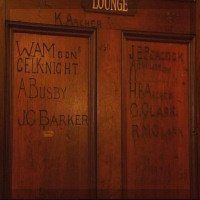 historic image of students initials carved into an architrave