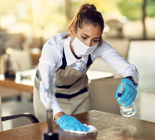 Cleaning And Sanitizing The Table — Poughkeepsie, NY — K&P Facilities Maintenance Cleaning And Sanitizing The Table — Poughkeepsie, NY — K&P Facilities Maintenance