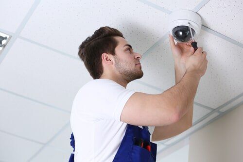 Professional CCTV Technician — Rum City Locks and Security in Bundaberg, QLD Professional CCTV Technician — Rum City Locks and Security in Bundaberg, QLD