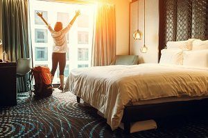 Hotel — Happy Traveler Inside the Hotel in Miami, FL