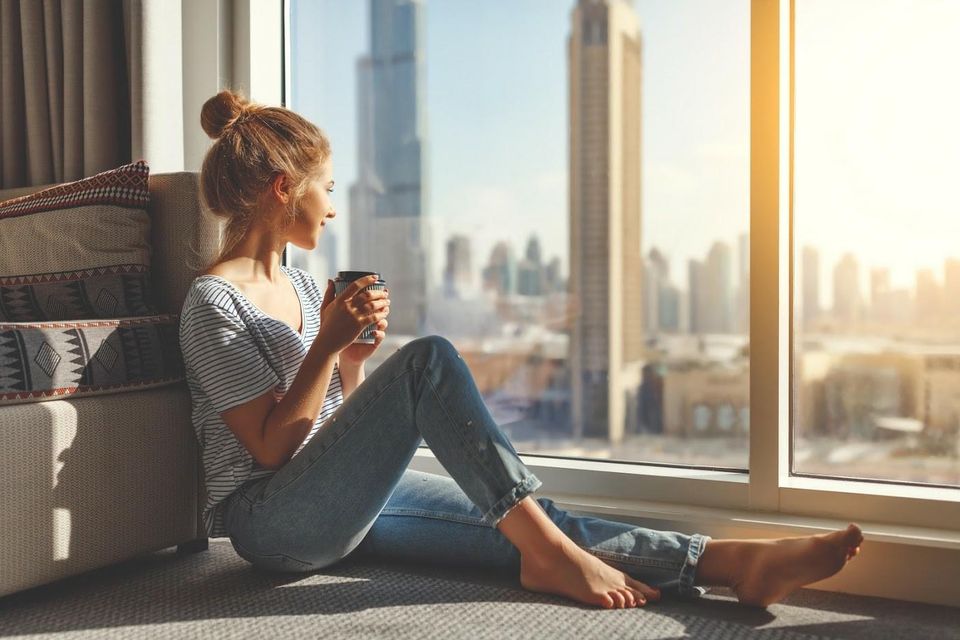 Woman Drinking a Coffee — Jacksonville, FL — Preservation Home Specialists Woman Drinking a Coffee — Jacksonville, FL — Preservation Home Specialists