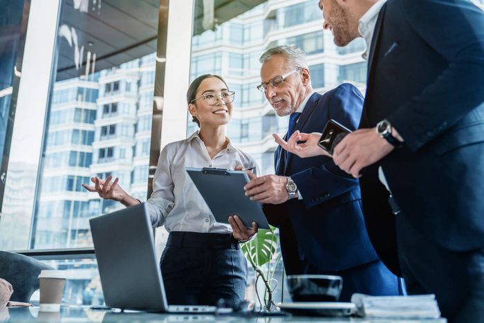 Business Colleagues Discussing — Dallas, TX — Vertex Principles Group