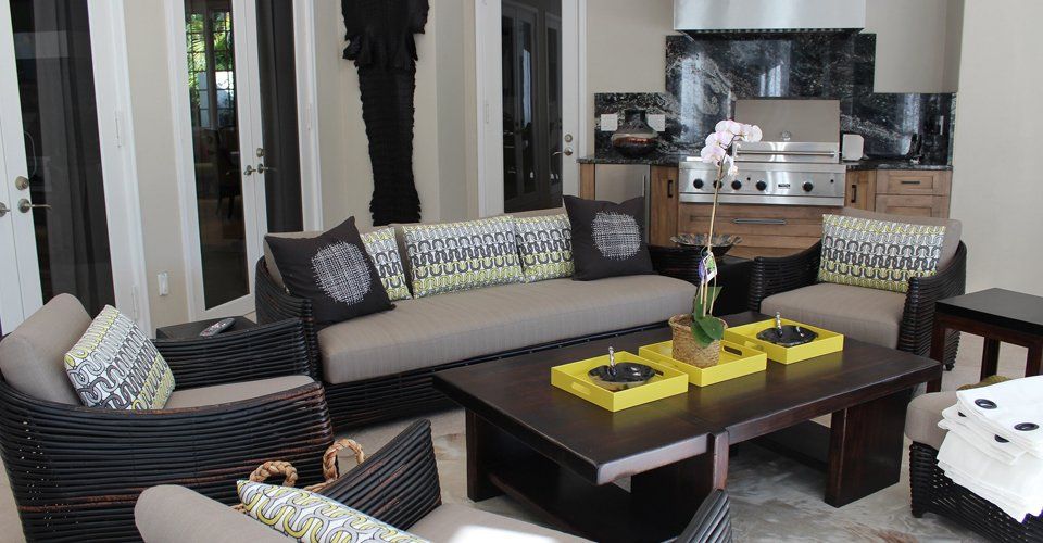 Crushioning  — Couch with Pillow and Glass Door in Fort Myers, FL