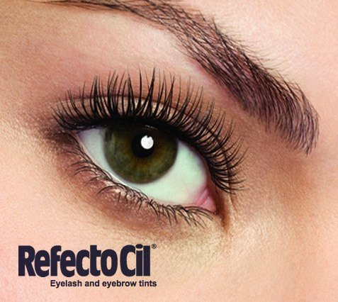 A close up of a woman 's eye with refectocil eyelash and eyebrow tints