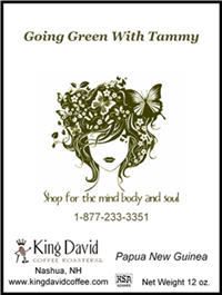 An advertisement for king david coffee roasters shows a woman with flowers in her hair.