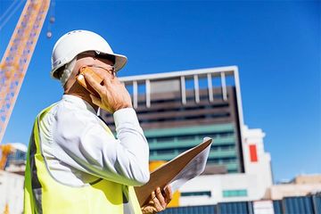 Engineer builder at construction site