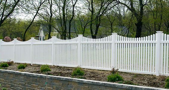 white narrowed space fence