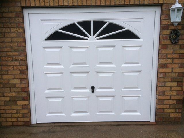 White painted wooden garage door