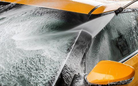 Full Service Car Wash — Worker Washing A Truck In Greenville, SC Full Service Car Wash — Worker Washing A Truck In Greenville, SC