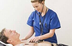 A Nurse Examining her Patient — Cardiologist in Bedford, IN