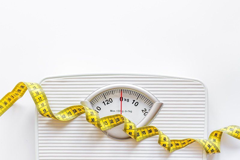 weighing scale and measuring tape