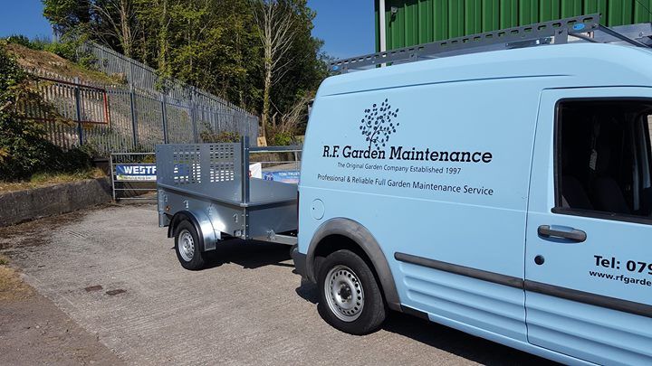 R.E. Garden Maintenance logo