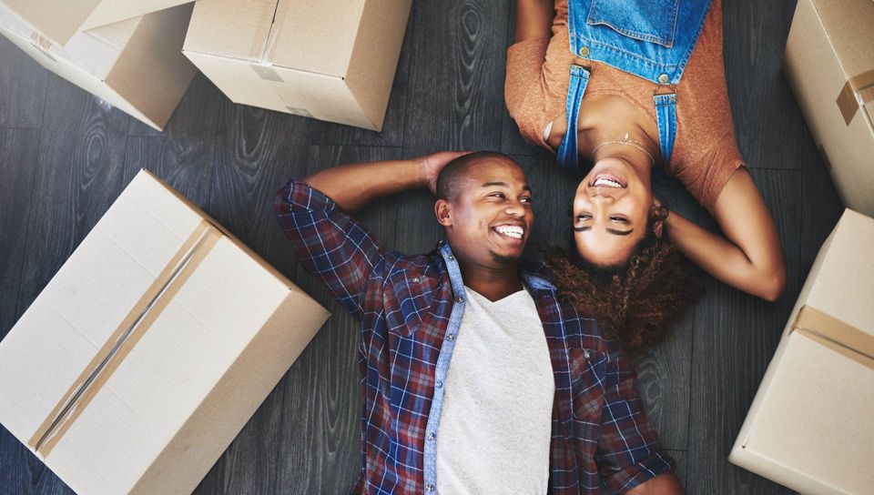 Couple Moving in with Boxes