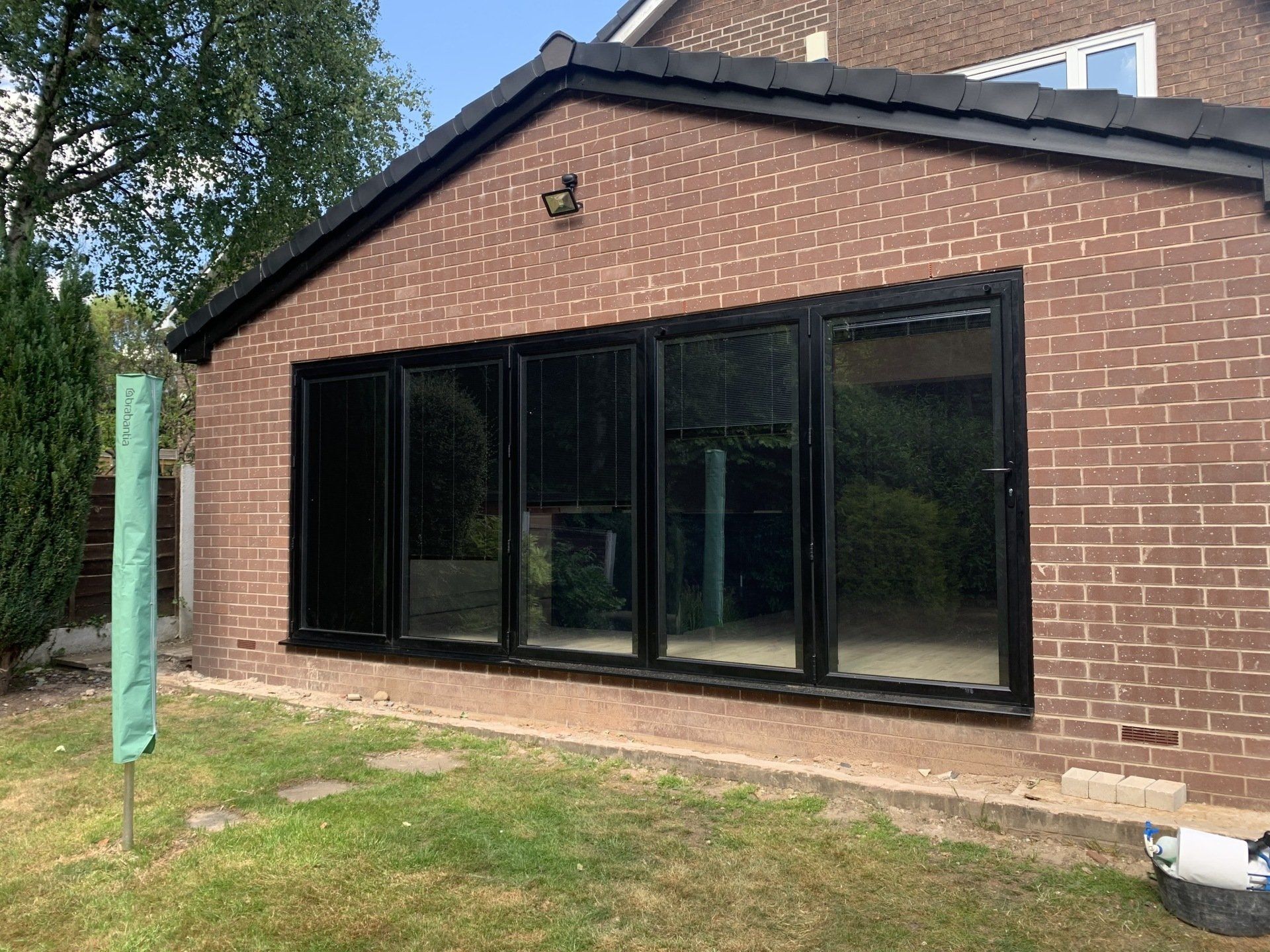 aluminium bifold doors installed in Banford rochdale with blinds