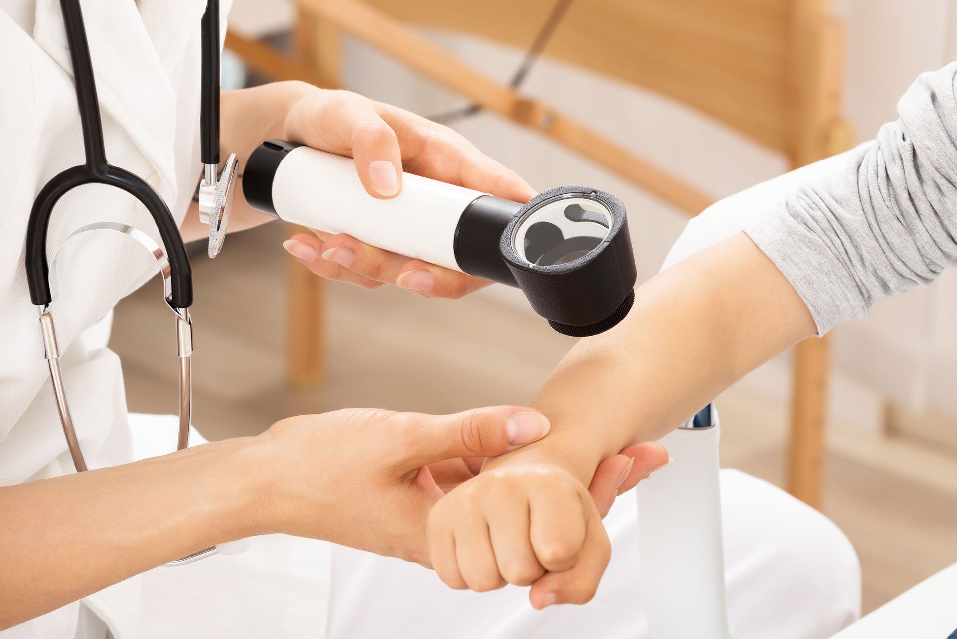 Doctor Checking Skin | Billings, MT | Fuller Family Medicine