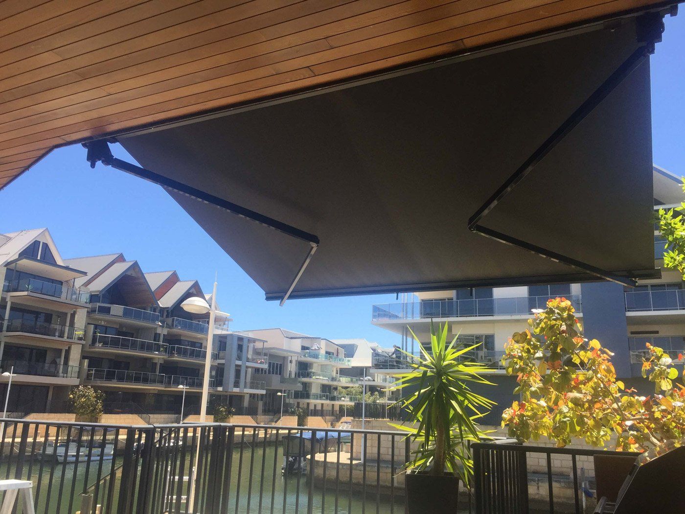 europa black frigerio folding arm awning