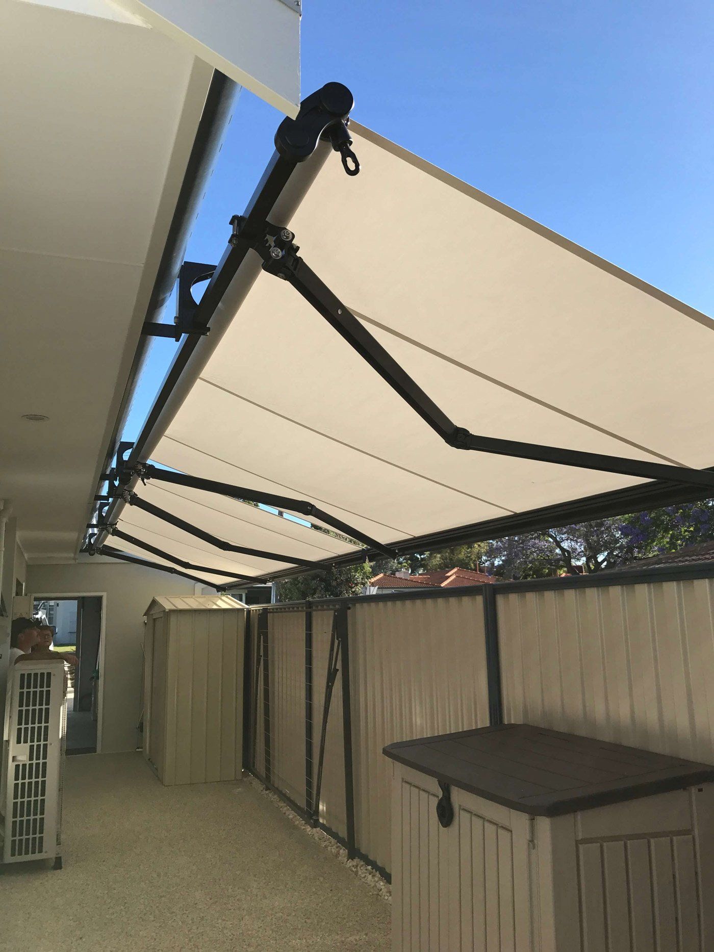 manual black frigerio folding arm awning