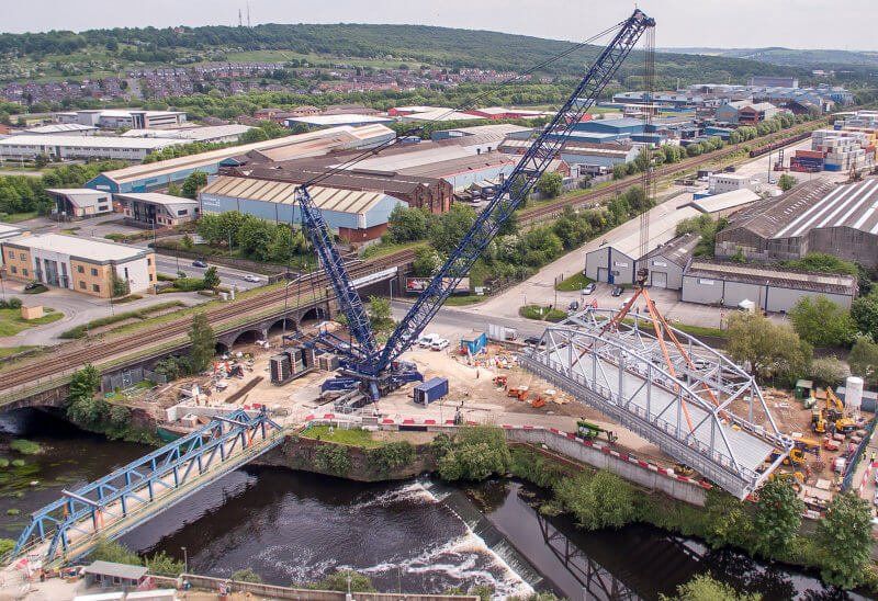 One of the UK's largest cranes swings a Reidsteel bridge into position